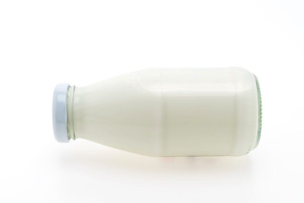vecteezy milk bottle glass isolated on white background 2229229 1