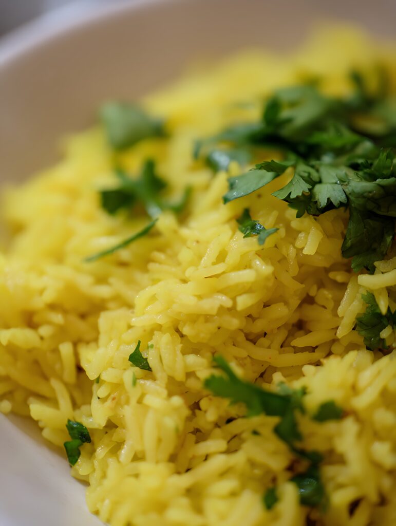 vecteezy close up of cilantro garnish on yellow rice a detailed food 67978555